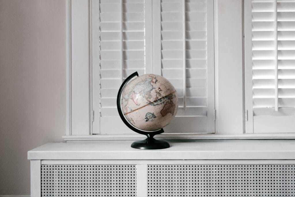 a globe on a window sill